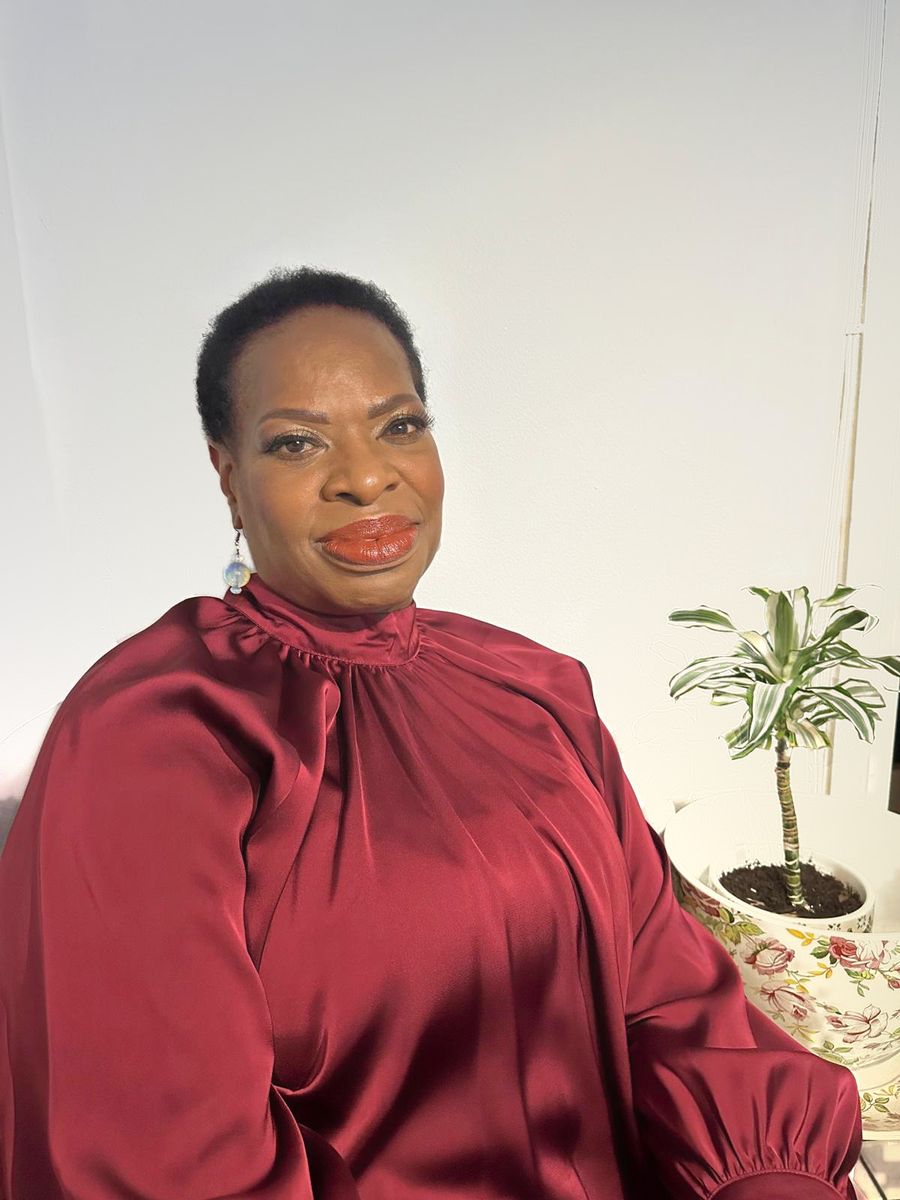 Anike Olaitan-Omole, counsellor at Core Sanctum, seated and smiling